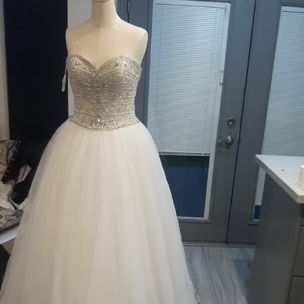 Elegant White Strapless Gown with Silver Embellishments